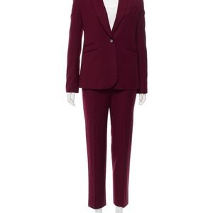 Burgundy Elizabeth and James suit size 2 Minho condition.